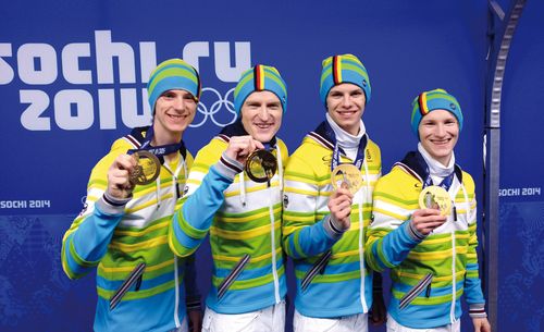 Foto von vier Medalliengewinnern